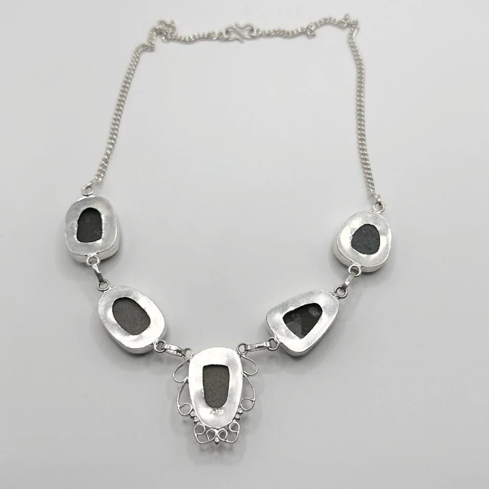 Unbranded sterling silver